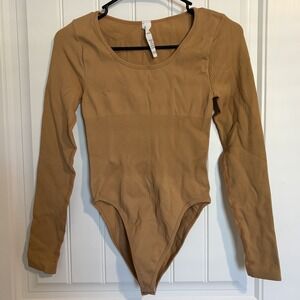 NWOT Women's Long Sleeve Camel Colored Body Suit Size S